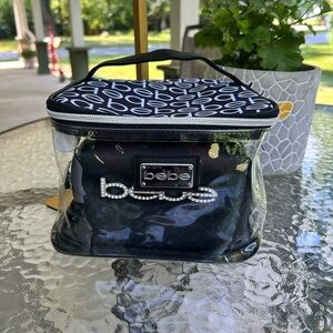 NWOT-Bebe Black and White Clear Cosmetic Bag